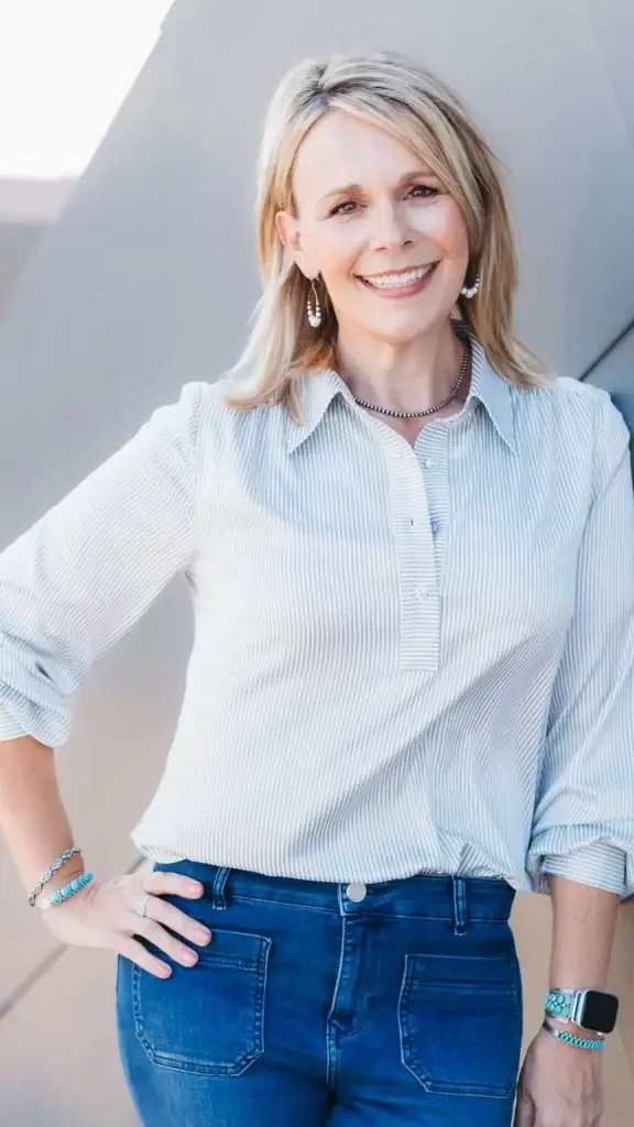 Tracy Pleschourt leaning against a wall